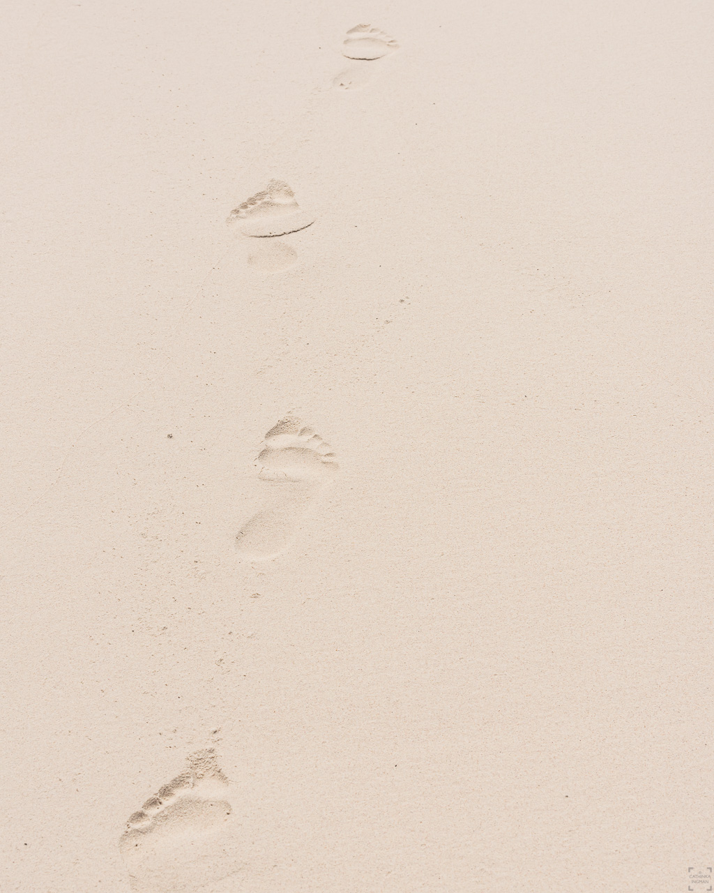 Fotspår i sanden på La Digue